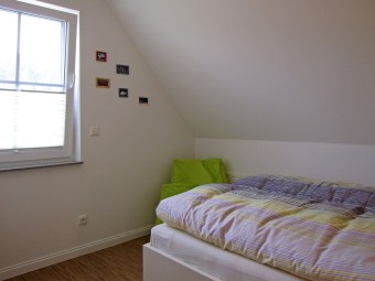 Ein Schlafzimmer im Dachgeschoss